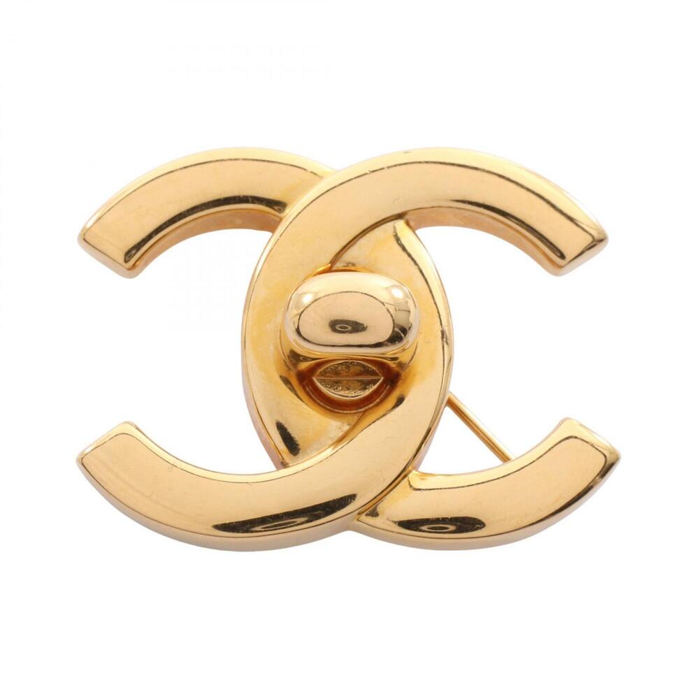 CHANEL Gold Logo Brooch